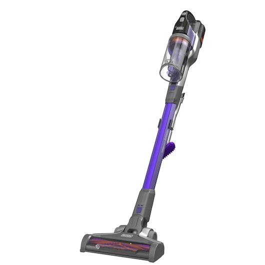 A BLACK+DECKER cordless stick vacuum cleaner with a purple and grey design, featuring a transparent dust container and a motorized brush head.